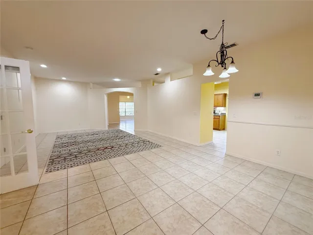 Additional view of Dining and Living room with recessed lighting, ceramic tile flooring and open floor plan