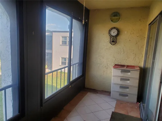 Enclosed porch off living room