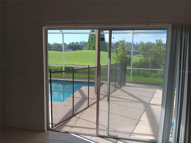 SLIDING DOOR TO POOL AND GOLF COURSE