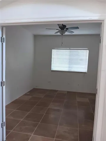 STUDY WITH EXPENSIVE WITH TRAVERTINE FLOOR
