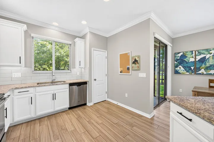 A window over the sink pulls in the natural light.