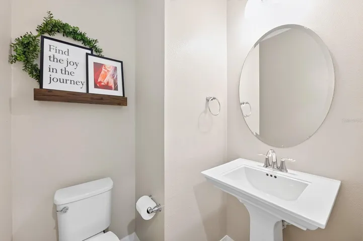 Main floor half bath convenient for guests.