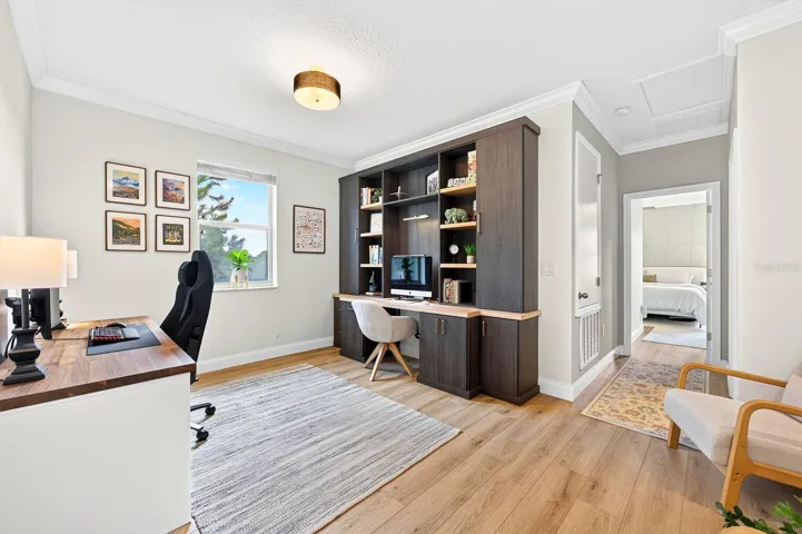 Loft space with a built-in desk.