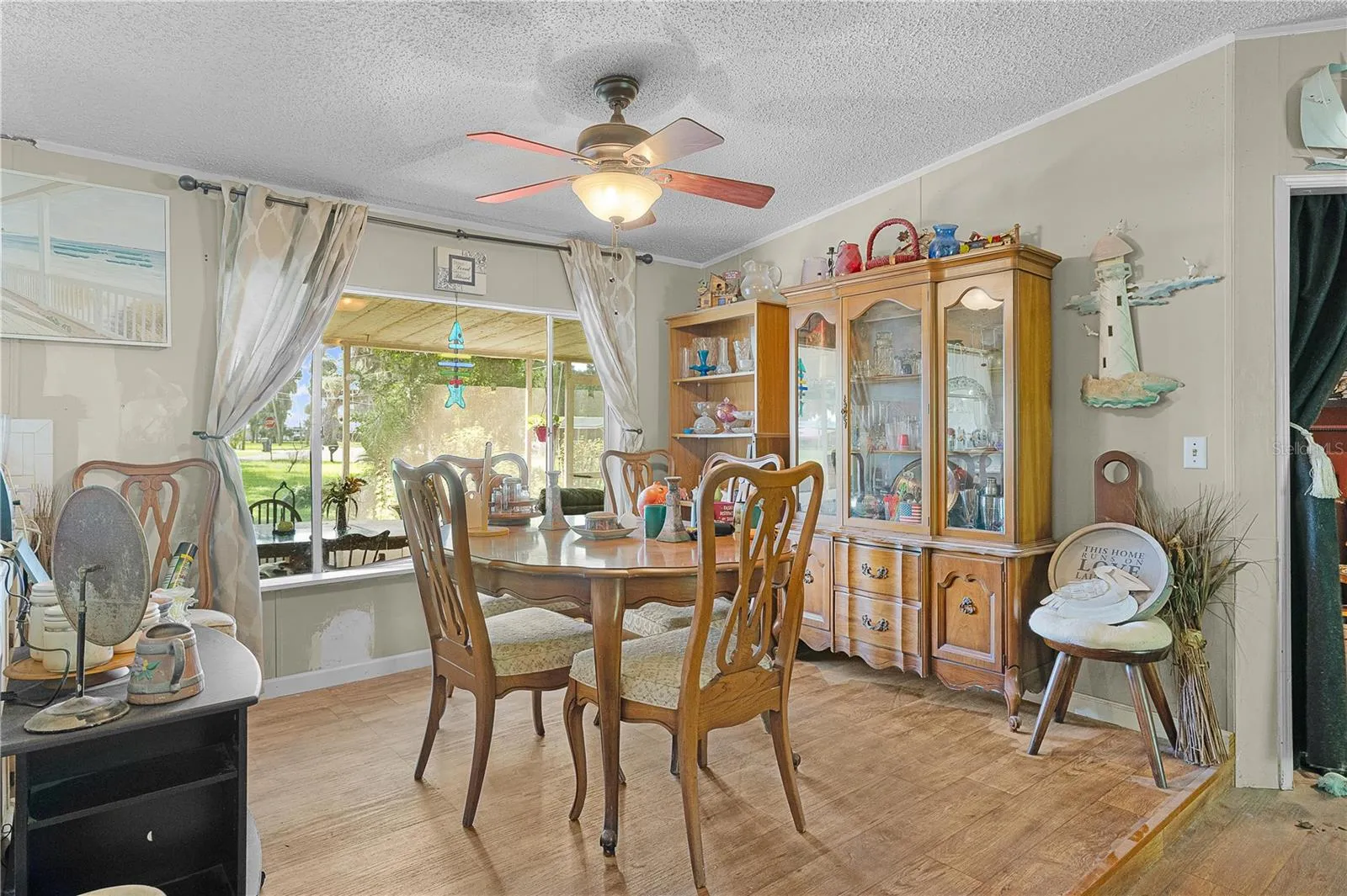 Spacious dining room area with elegant finishes, perfect for hosting and entertaining.
