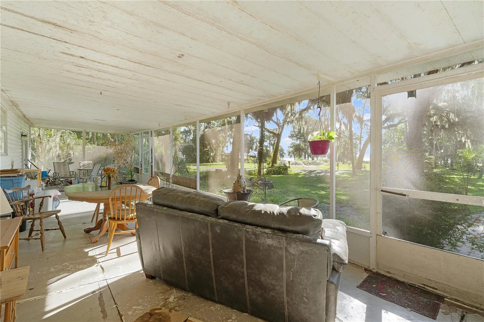 Huge screened porch with a view of lake