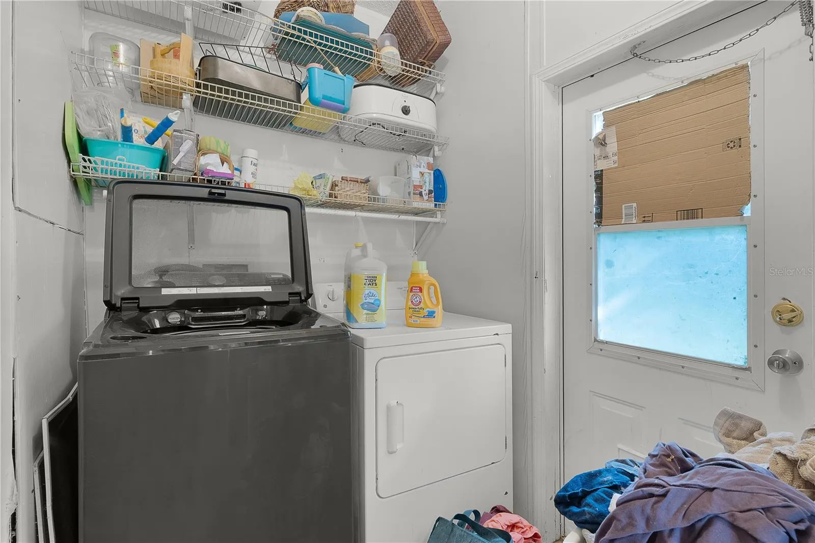 Indoor laundry, both washer and dryer convey