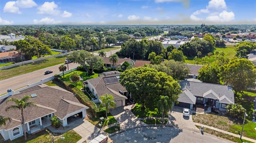 Ariel shot of the home and neighboring homes.