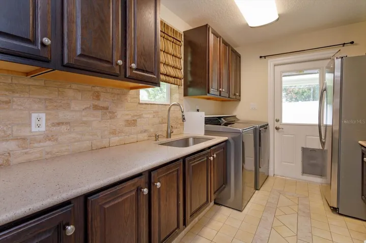Launder room with extra refrigerator