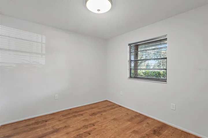 Each window has Bahama blinds