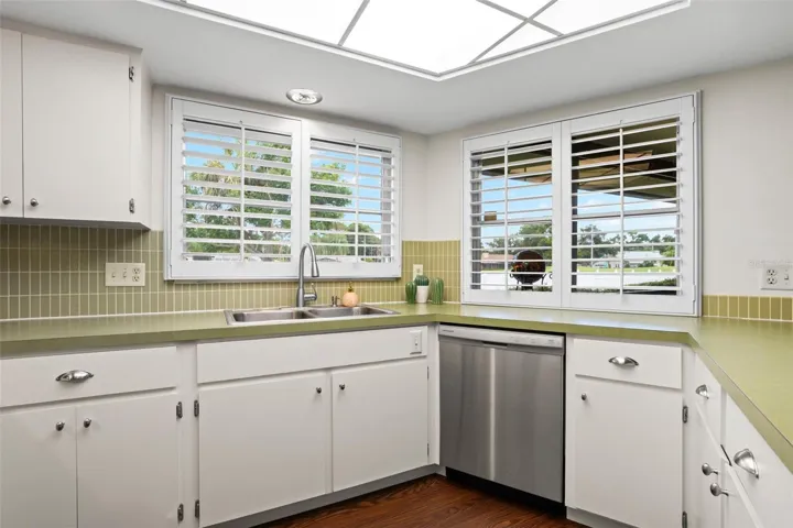 Kitchen with breakfast bar and golf course view