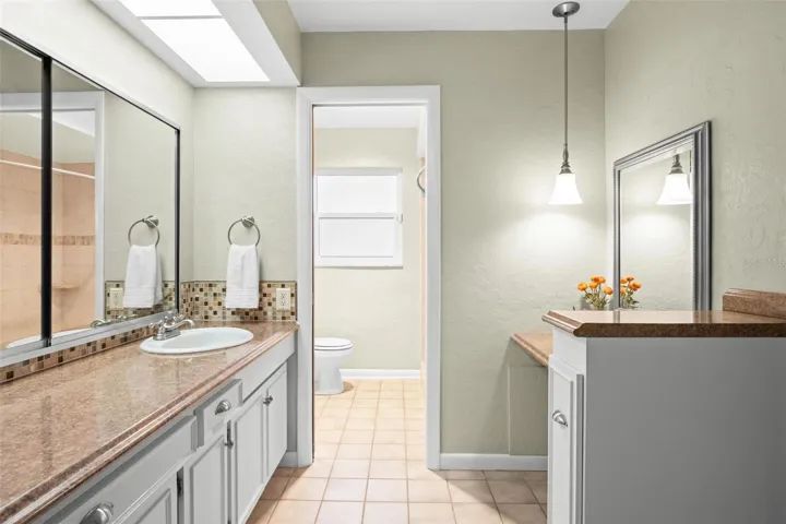Primary bathroom and make up vanity