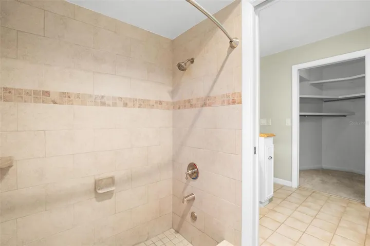Primary bathroom and walk-in closet