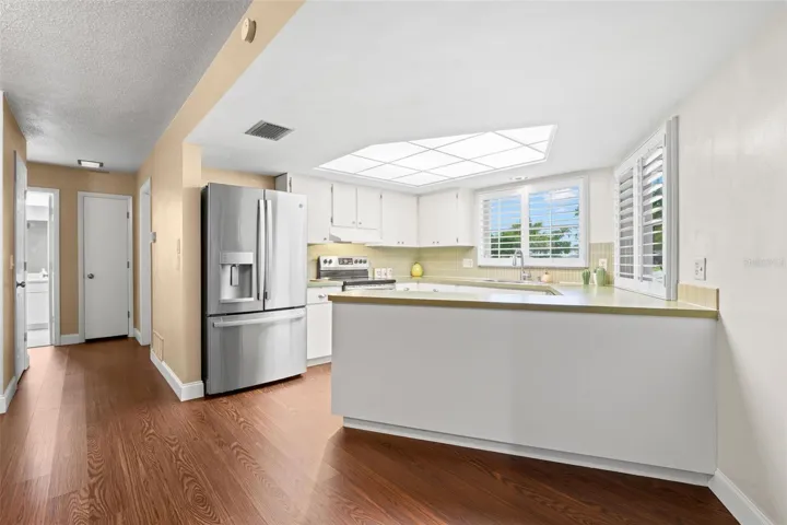 Kitchen with breakfast bar and golf course view