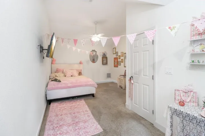 Spacious bedroom with plenty of space for queen sized bed and large walk in closet.