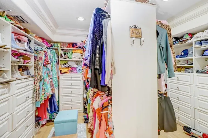 A dream closet to behold! Plenty of storage space for his and hers.