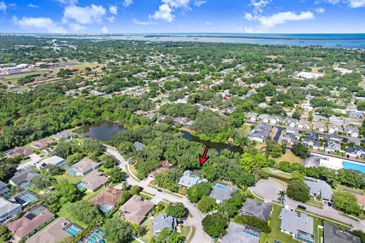 Another drone view of home and neighborhood.