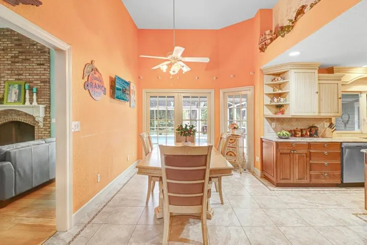 Ceramic tile throughout kitchen with pot shelves