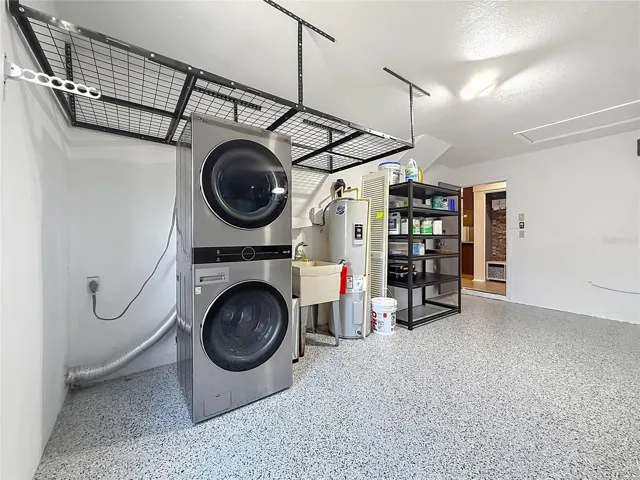 Garage with Laundry Area and Storage