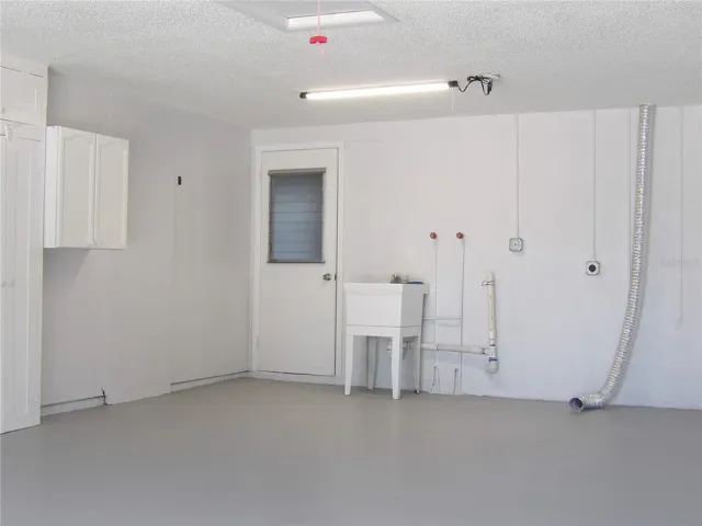 Garage laundry hook ups Washer, dryer and sink