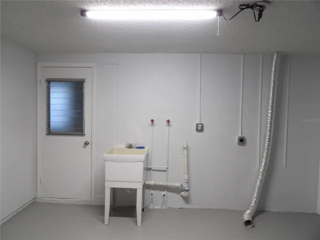 laundry hook ups Washer, dryer and sink