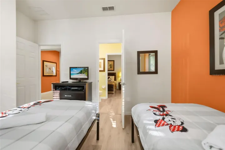 Alternate view of the Disney-themed twin bedroom with direct access to the adjoining Jack-and-Jill bathroom.
