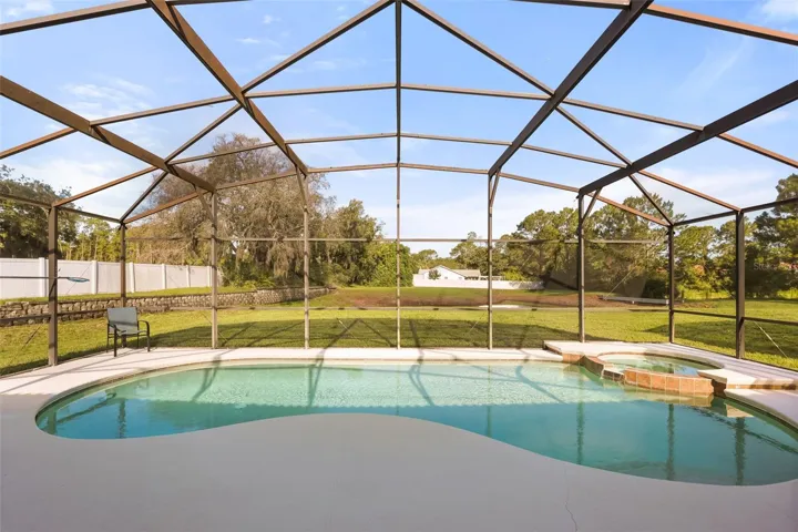 Sparkling private swimming pool and in-ground spa overlooking peaceful conservation views with no rear neighbors.