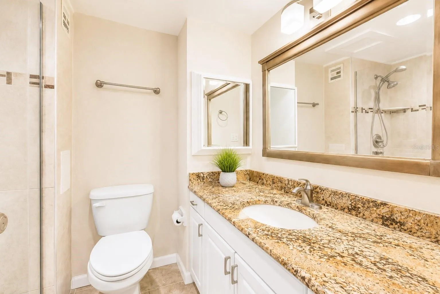 Updated bathroom with walk-in shower.