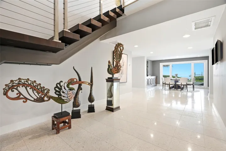 Foyer with custom terrazzo tile floors.