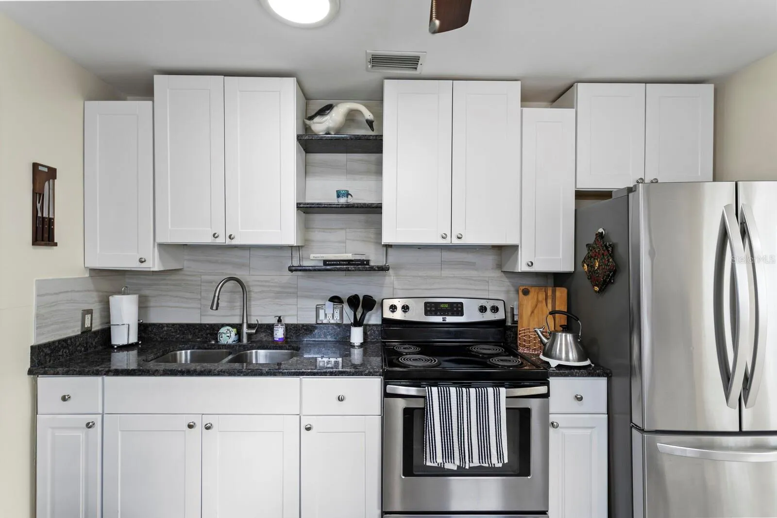 Newer upgraded cabinets granite counter tops.