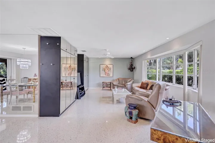 Virtually Staged showing Terrazzo Flooring beneath the Carpet.