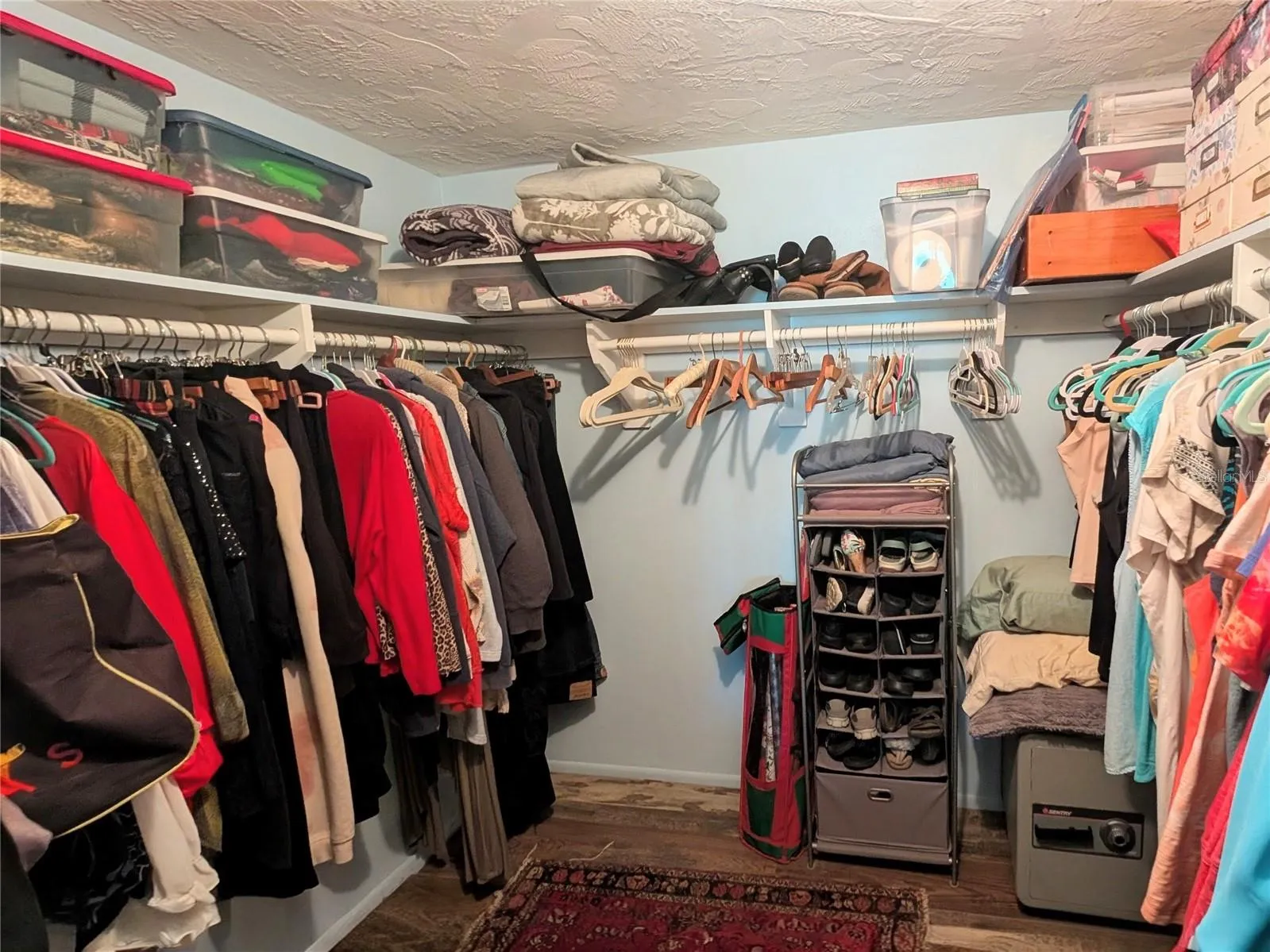 Primary bedroom walk in  closet