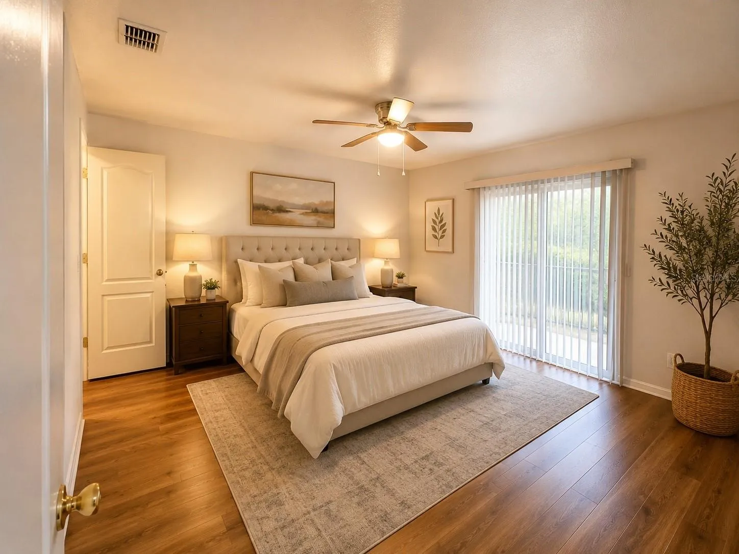 Bedroom 2 w/access to back patio