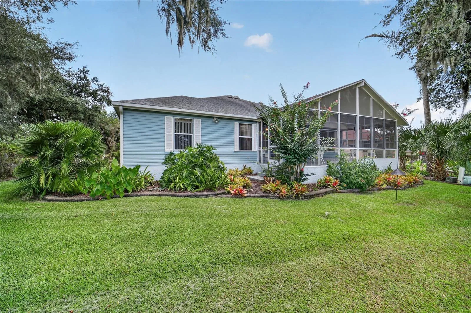 Back of House with Lanai from Golf Course
