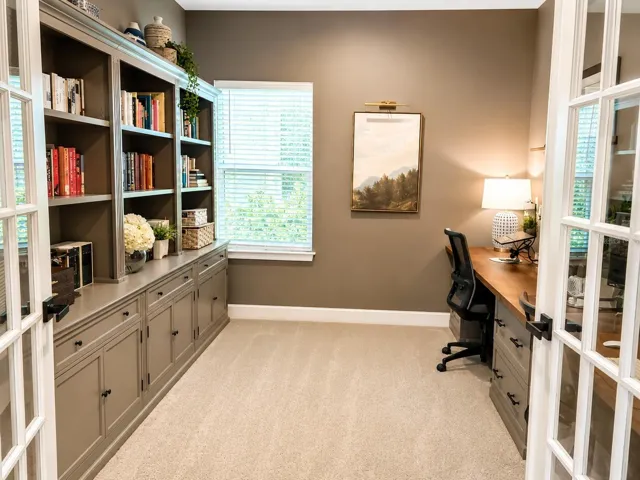 Dedicated office/study/den with glass french doors