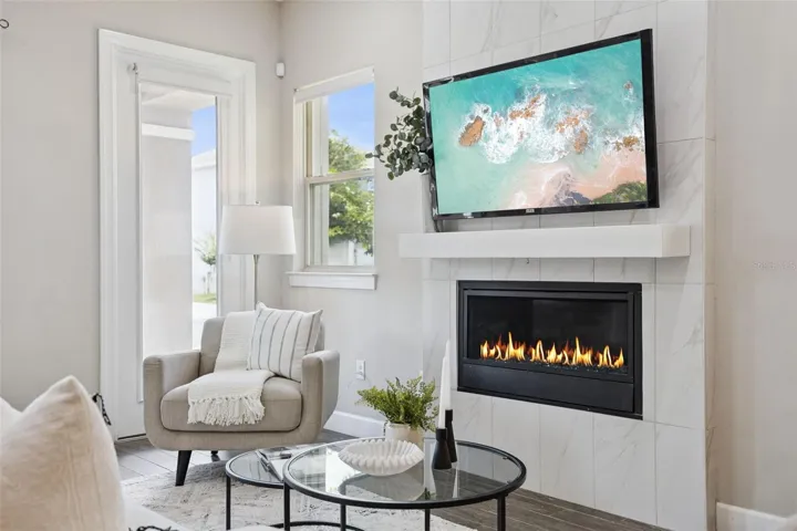 Main level Flex Space with in-wall fireplace
