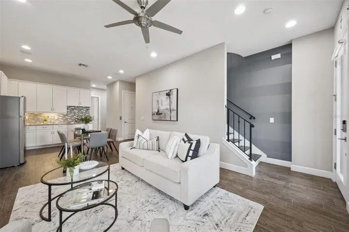 Flex Space with Wet Bar, cabinetry, refrigerator for potential extended family suite & elevator