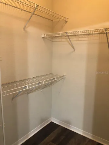 Walk-in closet in bedroom