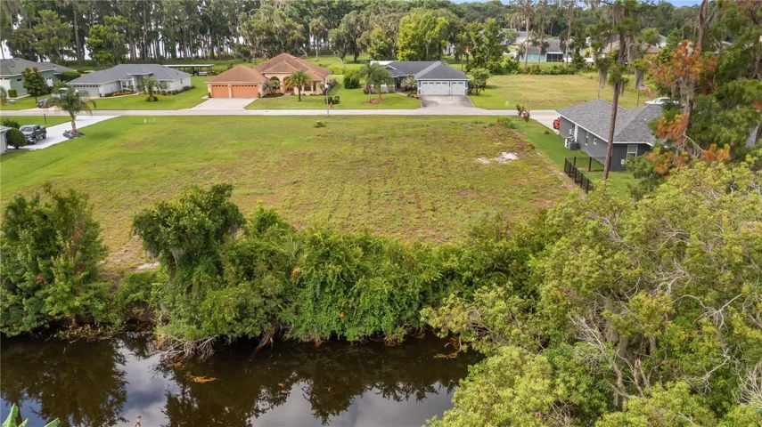 12045 Eagle Point Ct. Leesburg 34788 Vacant Residential Waterfront canal lot off of Lake Eustis FOR SALE