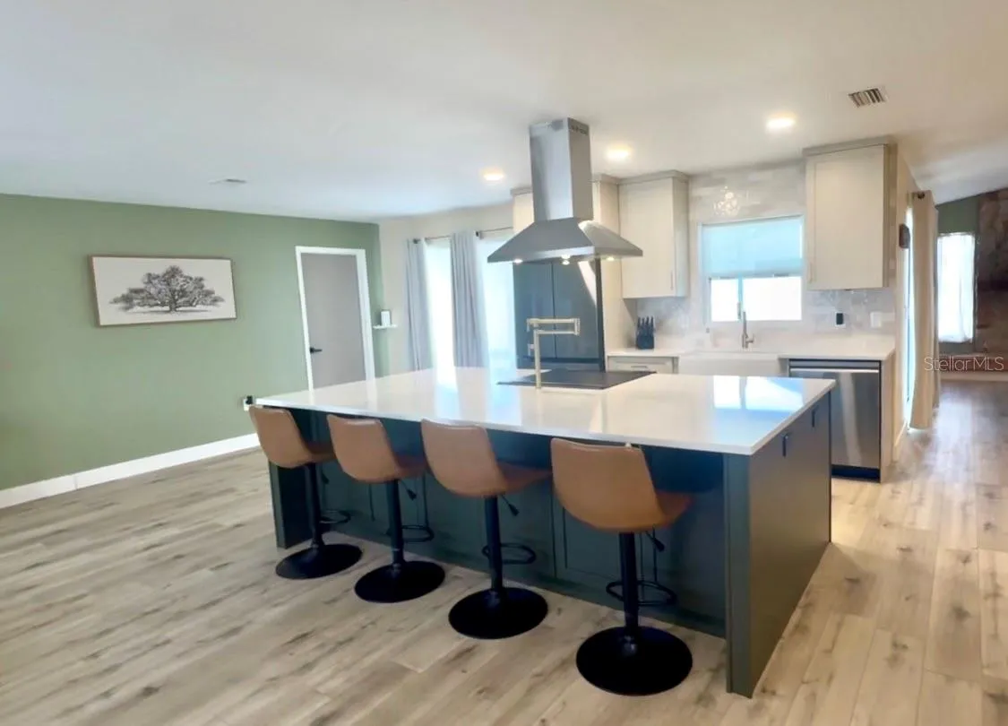 Great Room w/Kitchen Island with underneath cabinets