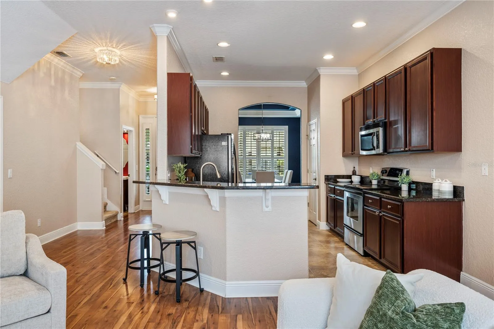 Laminate flooring throughout the living space