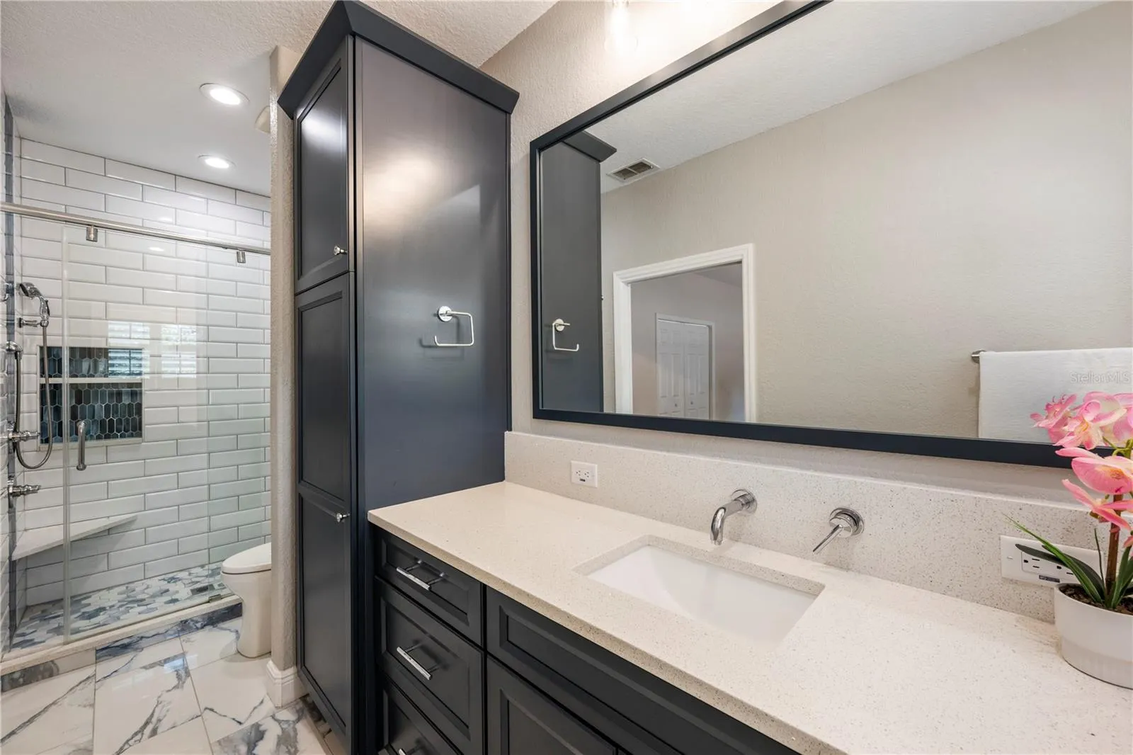 Walk-in Shower and large vanity