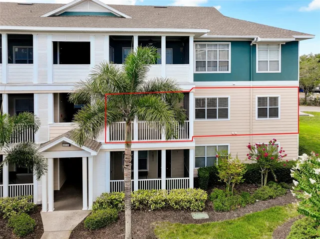 unit #1410 is a 2nd floor condo with screened balcony; location in the building outlined in red.