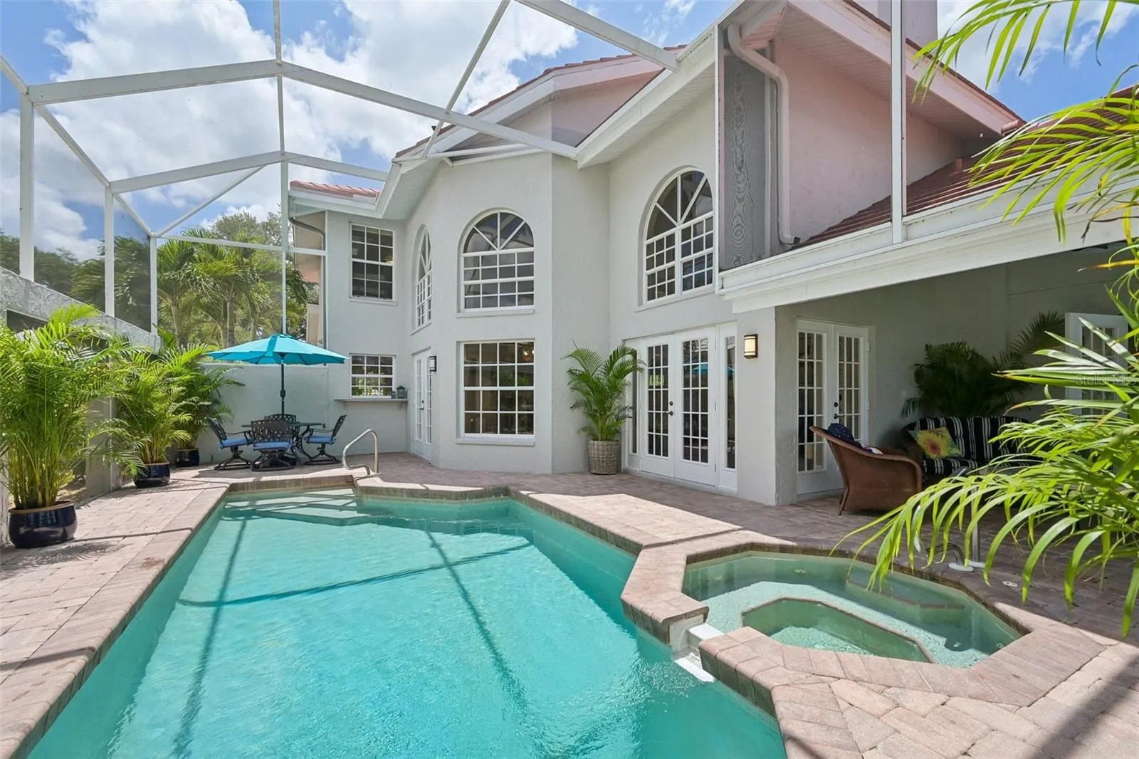 Entertain on your oversized screened lanai with several seating areas, heated pool and spa, and gorgeous golf course views.