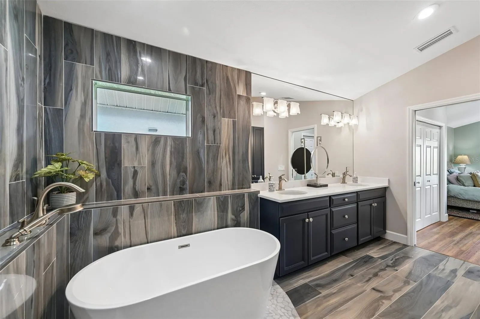 Relax in your spa-inspired primary ensuite with double vanities, oversized shower with two heads, soaker tub, lots of natural light.
