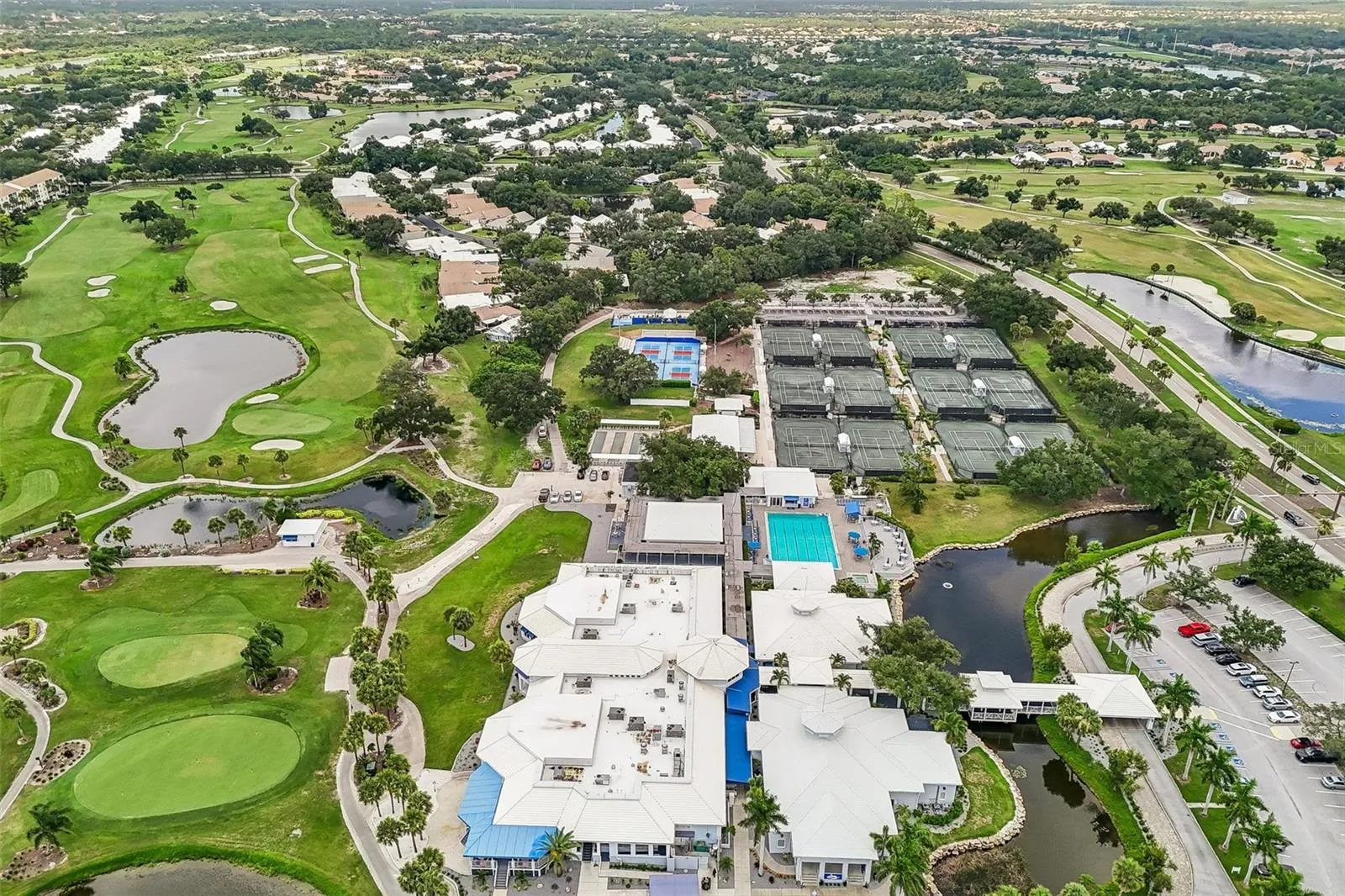 Clubhouse with pool, tennis, bocce, social club, etc. Membership optional.