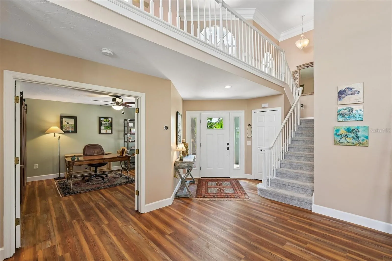 Front entrance with office (or 2nd bedroom) and stairs to the loft, 3rd bedroom and 3rd bathroom upstairs.