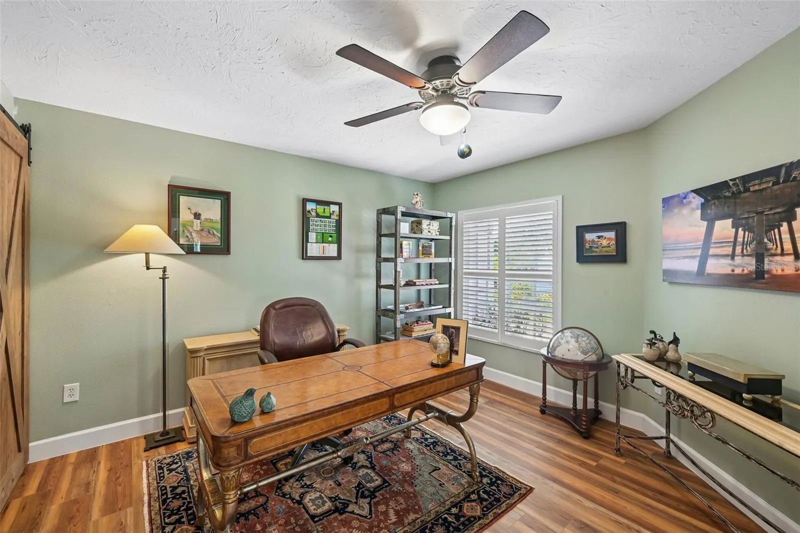 2nd bedroom on main floor, currently utilized as an office.