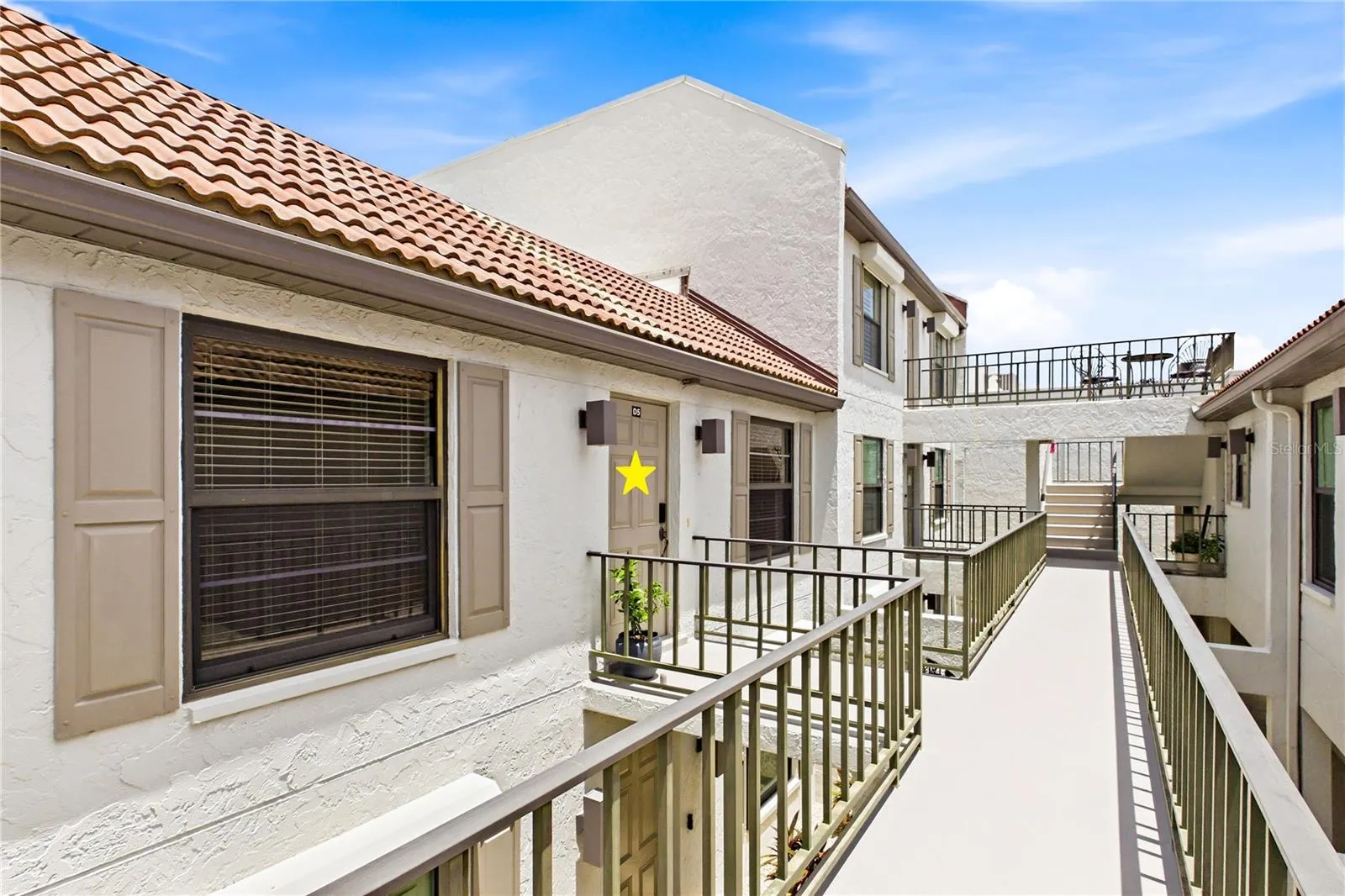 Second-floor unit entry with no through foot traffic passing by your front door