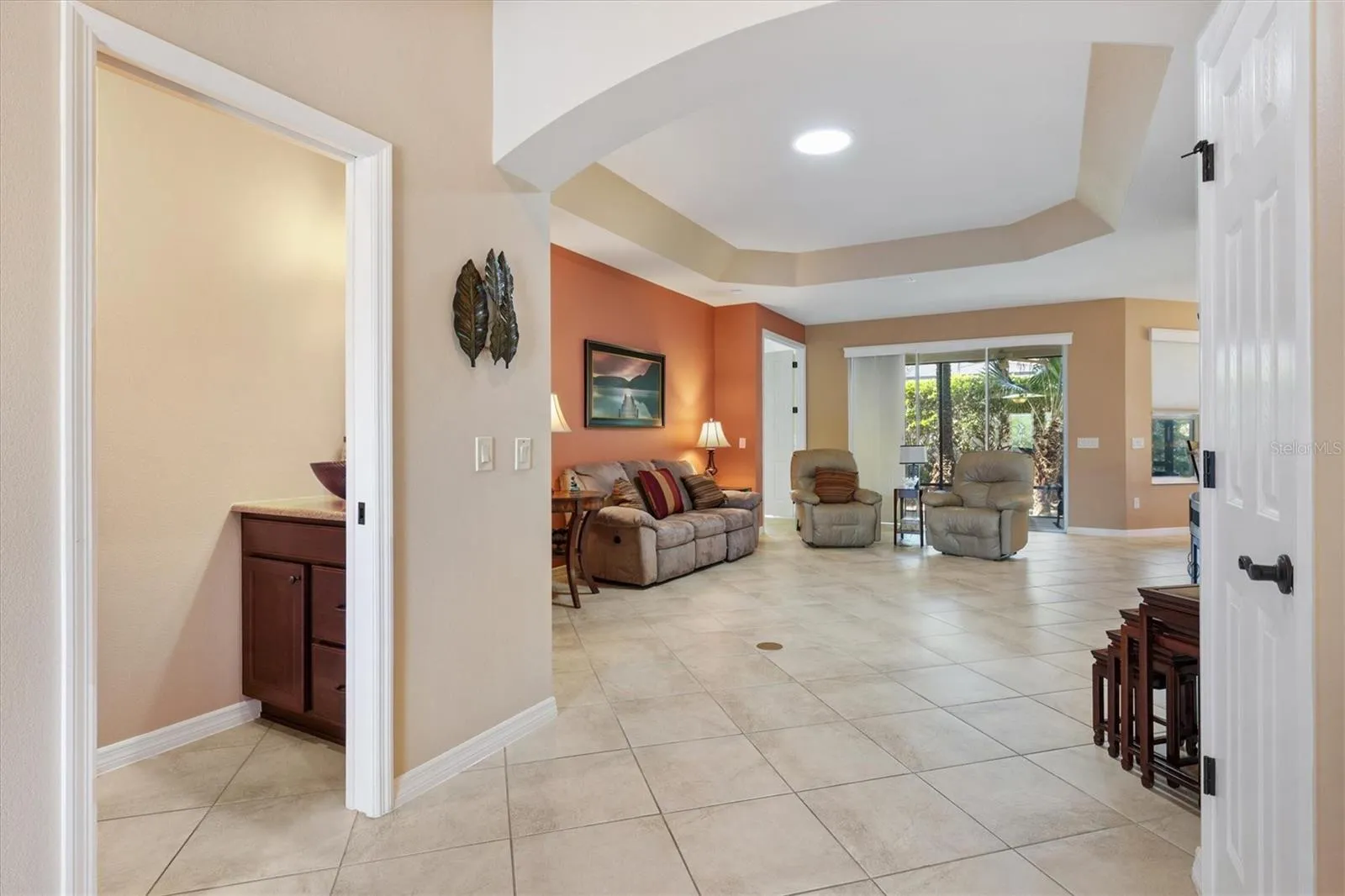 Foyer showing Half Bath and Living Room