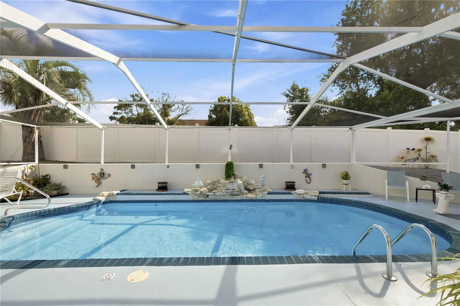 Great pool with waterfall for entertaining.
